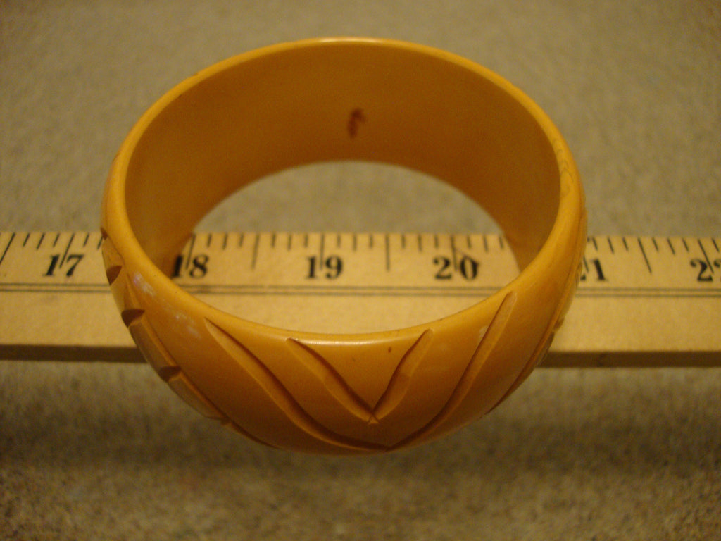 Vintage 1.5" Goldenrod Bakelite Bracelet! Abstract Flower/Leaf Carved Design!