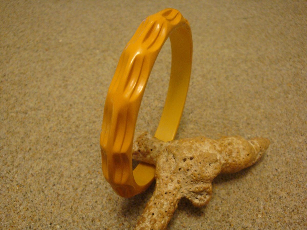 Vintage Goldenrod Bakelite Bracelet: Carved Thumbprint Design