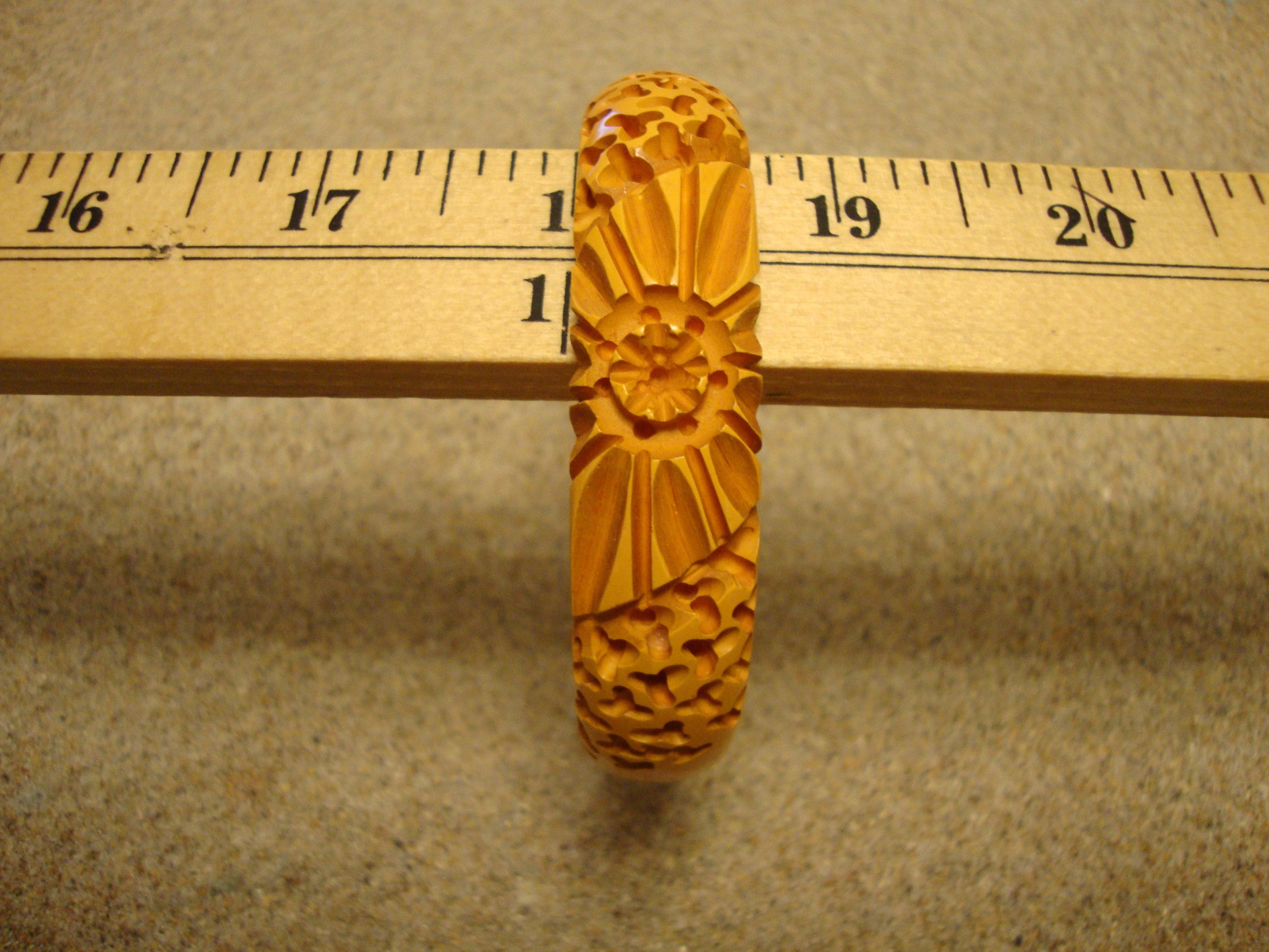 Vintage Goldenrod Bakelite Bracelet: Carved Flower & Wormwood Design