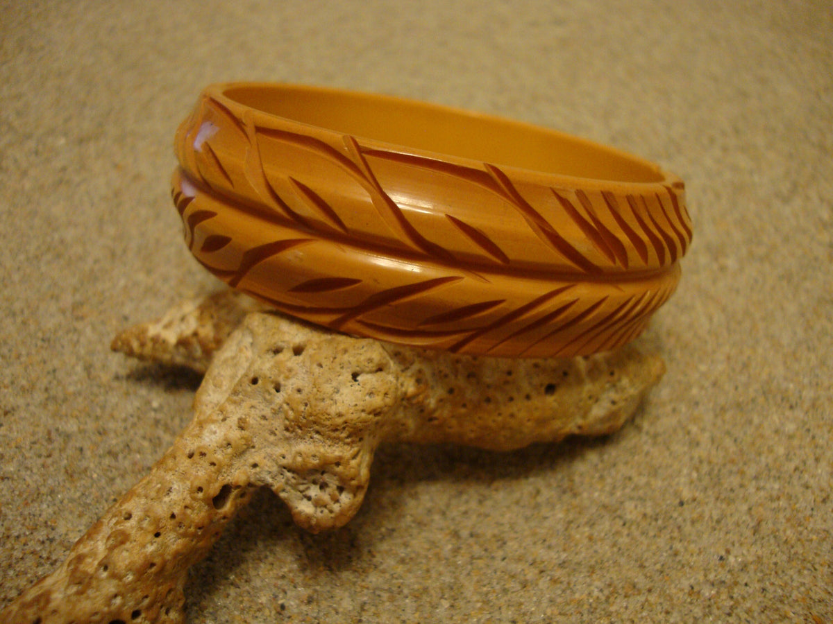 Vintage Goldenrod Bakelite Bracelet: Carved Vine & Leaf Design