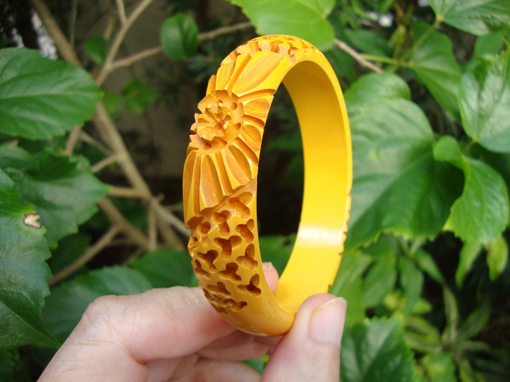 Vintage Goldenrod Bakelite Bracelet: Carved Flower & Wormwood Design