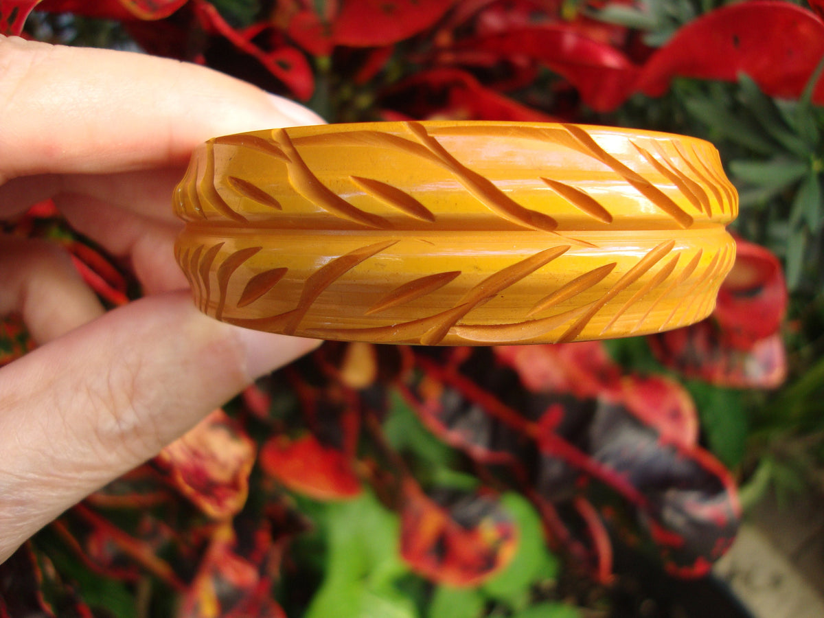Vintage Goldenrod Bakelite Bracelet: Carved Vine & Leaf Design