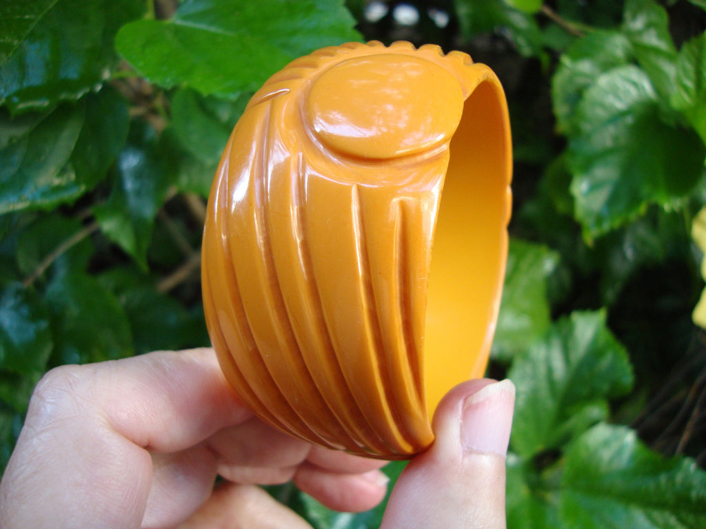 Vintage 1.5" Goldenrod Bakelite Bracelet! Abstract Flower/Sun? Carved Design!