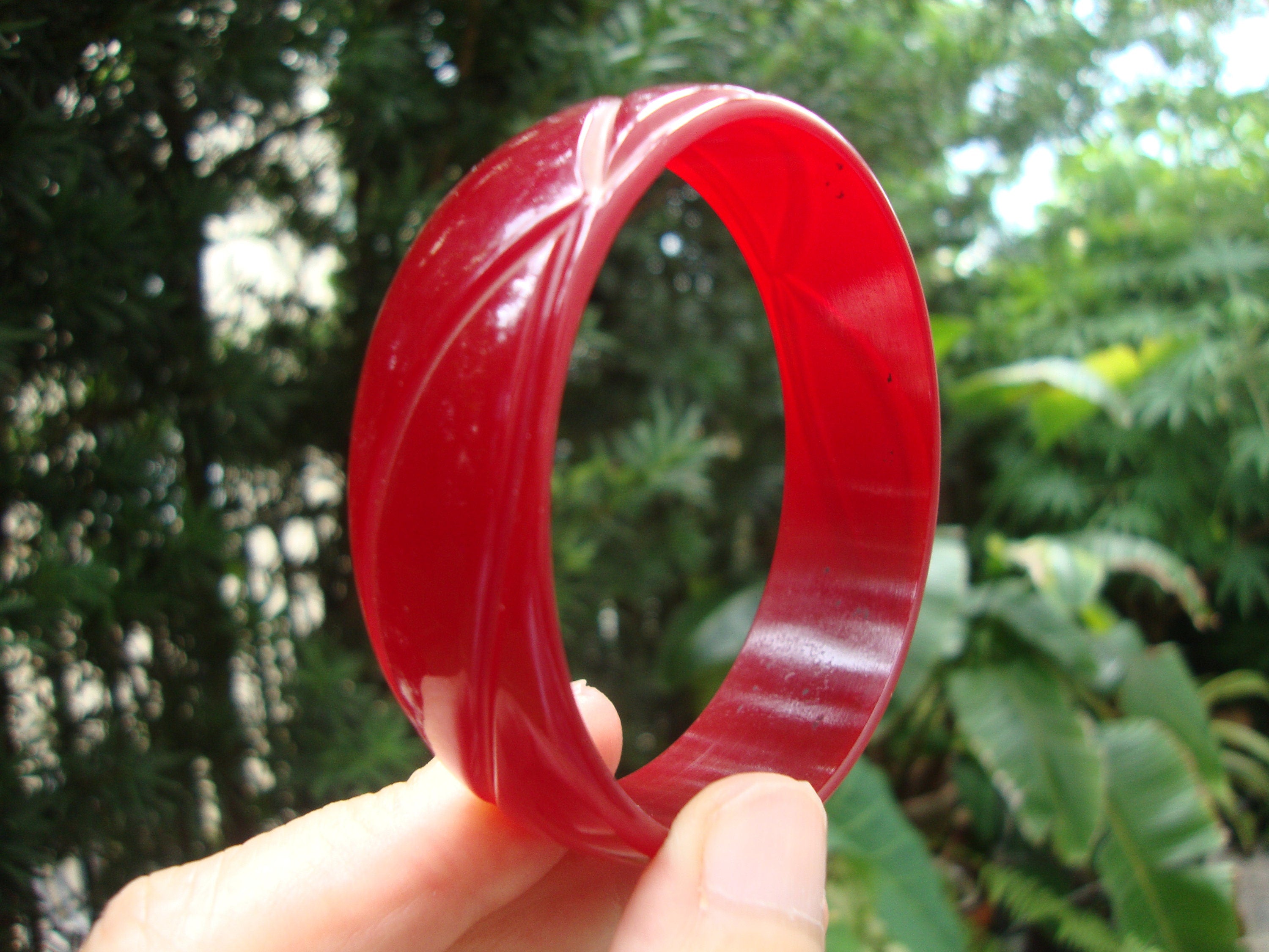 Vintage Ruby Red Bakelite Bracelet: Abstract Flower Carvings