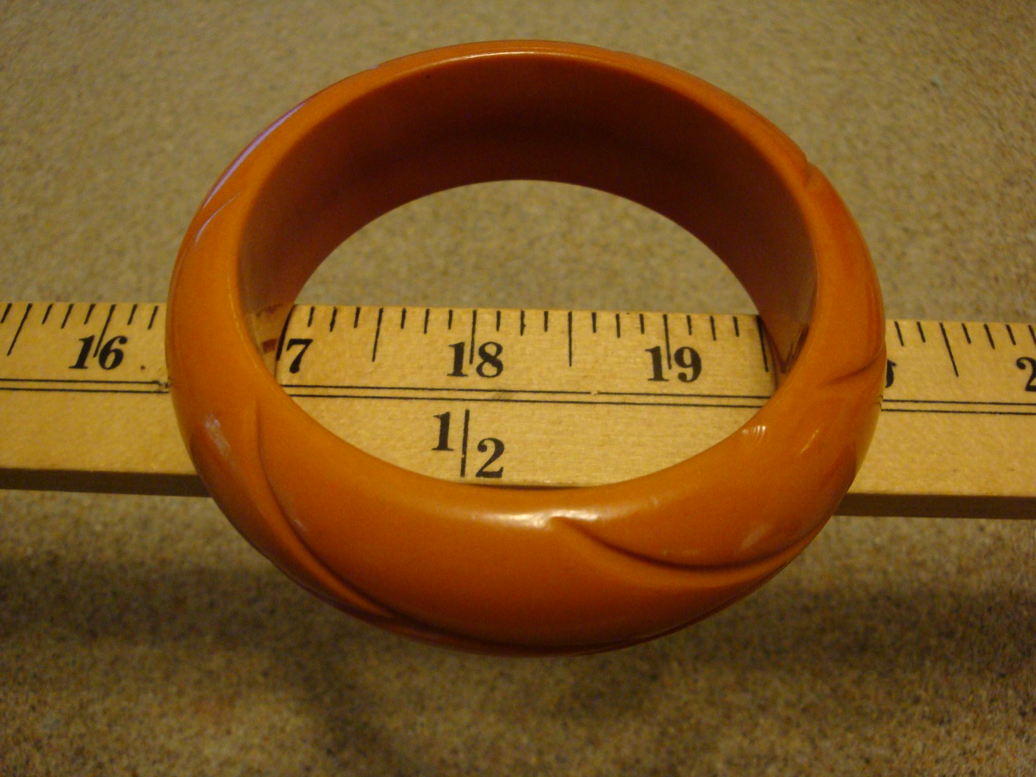 Vintage Burnt Orange Bakelite Bracelet: Abstract Vine Carvings