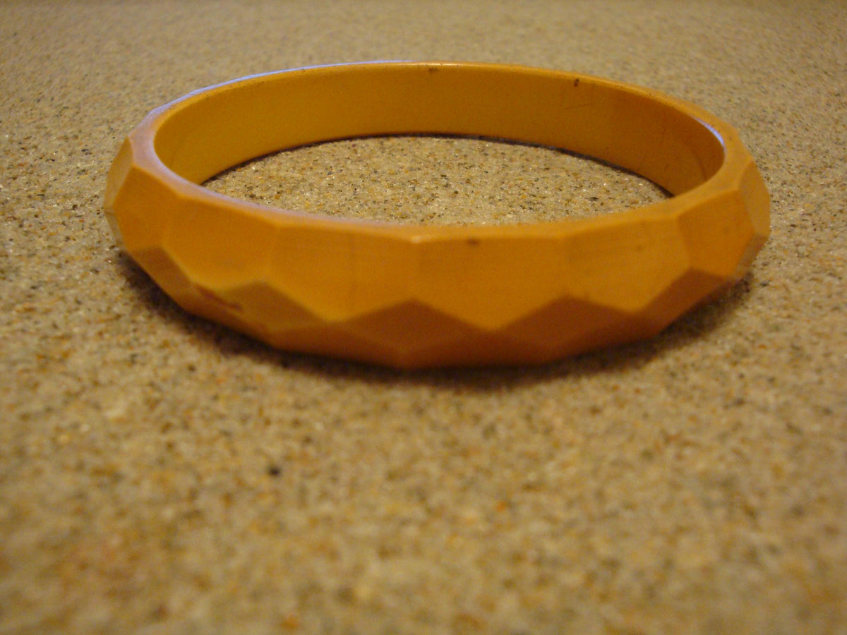 Vintage 1/2" Goldenrod Bakelite Bracelet w/ Diamond & Pentagon Shaped Facets!