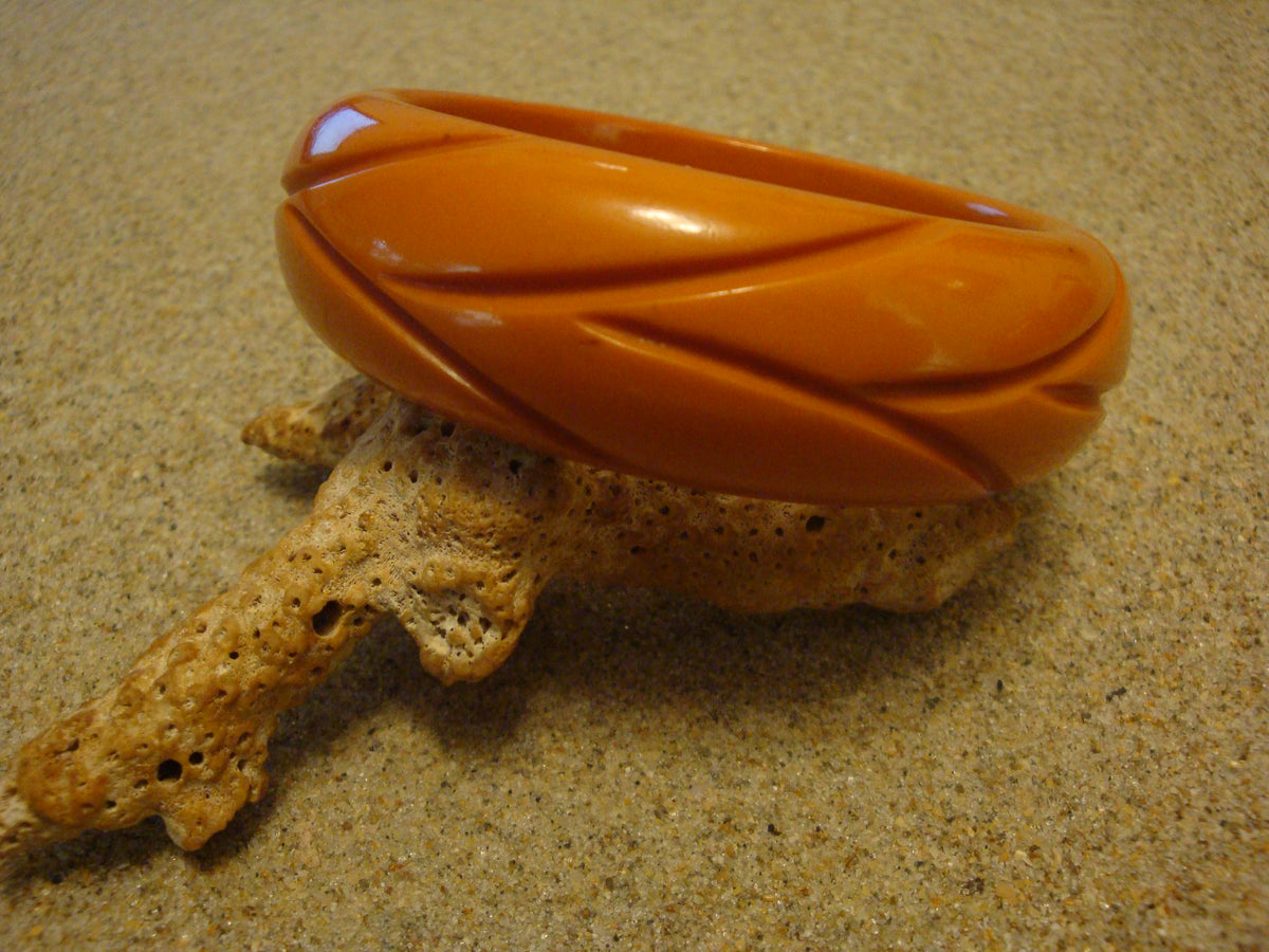 Vintage Burnt Orange Bakelite Bracelet: Abstract Vine Carvings