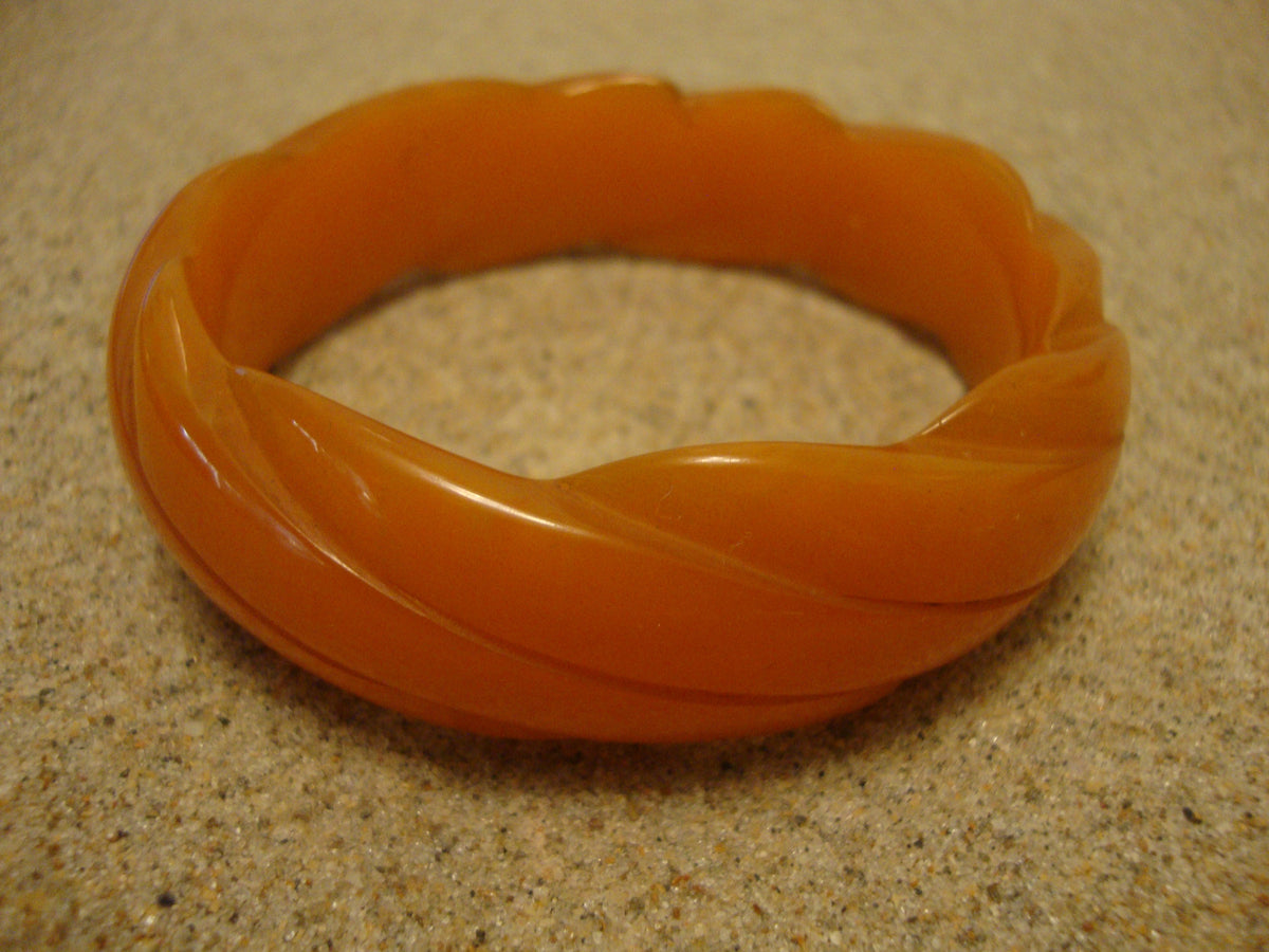 Vintage Semi Translucent Tangerine Bakelite Bracelet w/ Diagonal Slash Carvings!