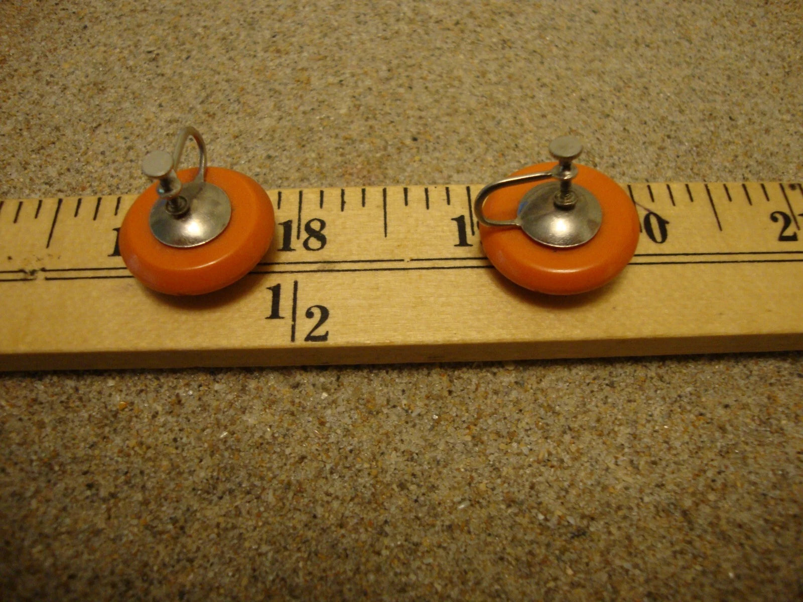 Vintage 7/8" Screw Back Bakelite Earrings; Burnt Orange w/ Flower Carvings!