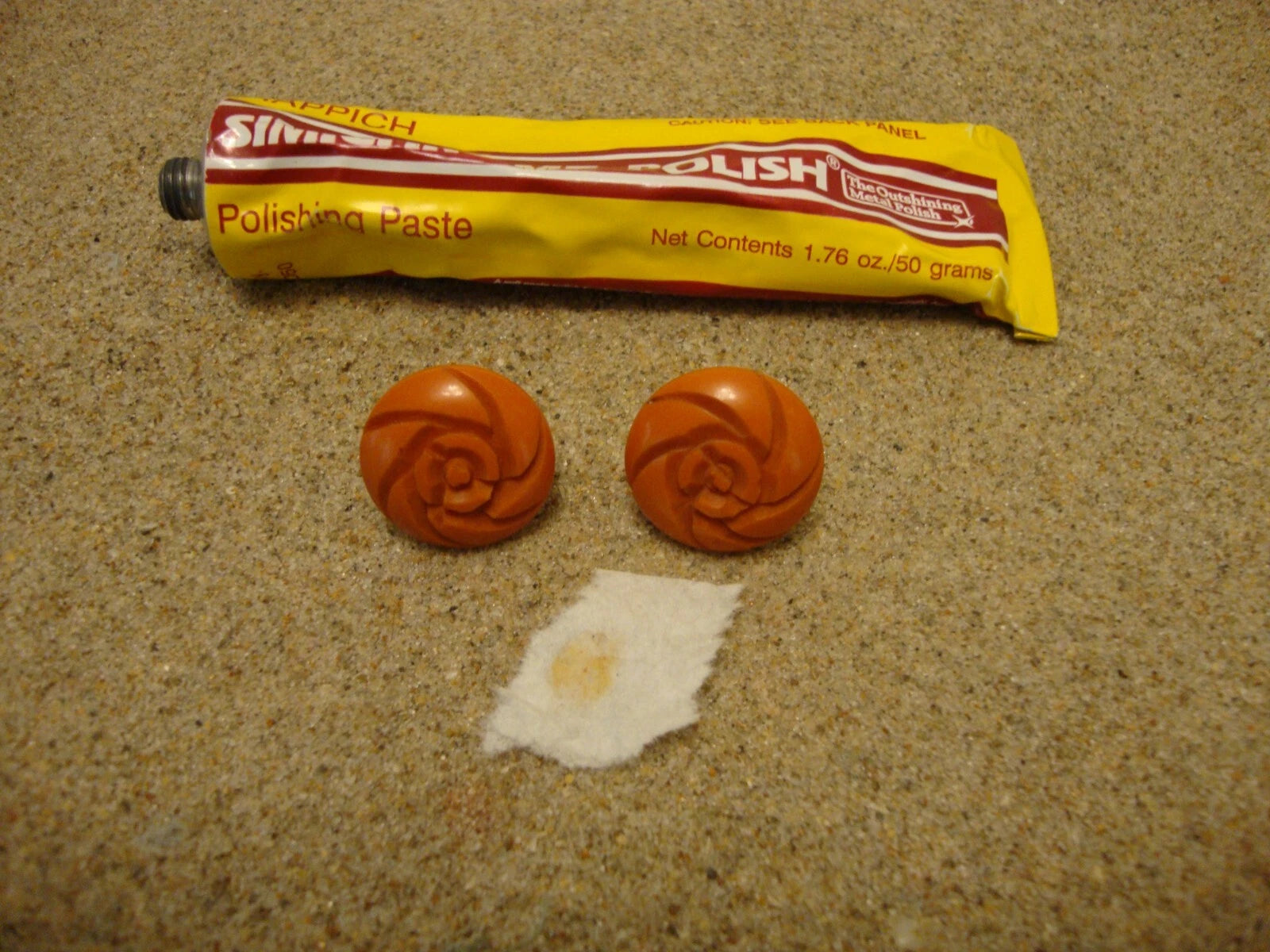 Vintage 7/8" Screw Back Bakelite Earrings; Burnt Orange w/ Flower Carvings!