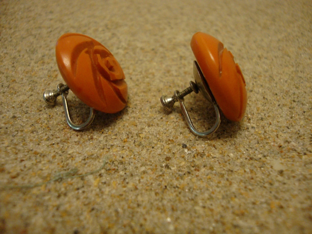 Vintage 7/8" Screw Back Bakelite Earrings; Burnt Orange w/ Flower Carvings!